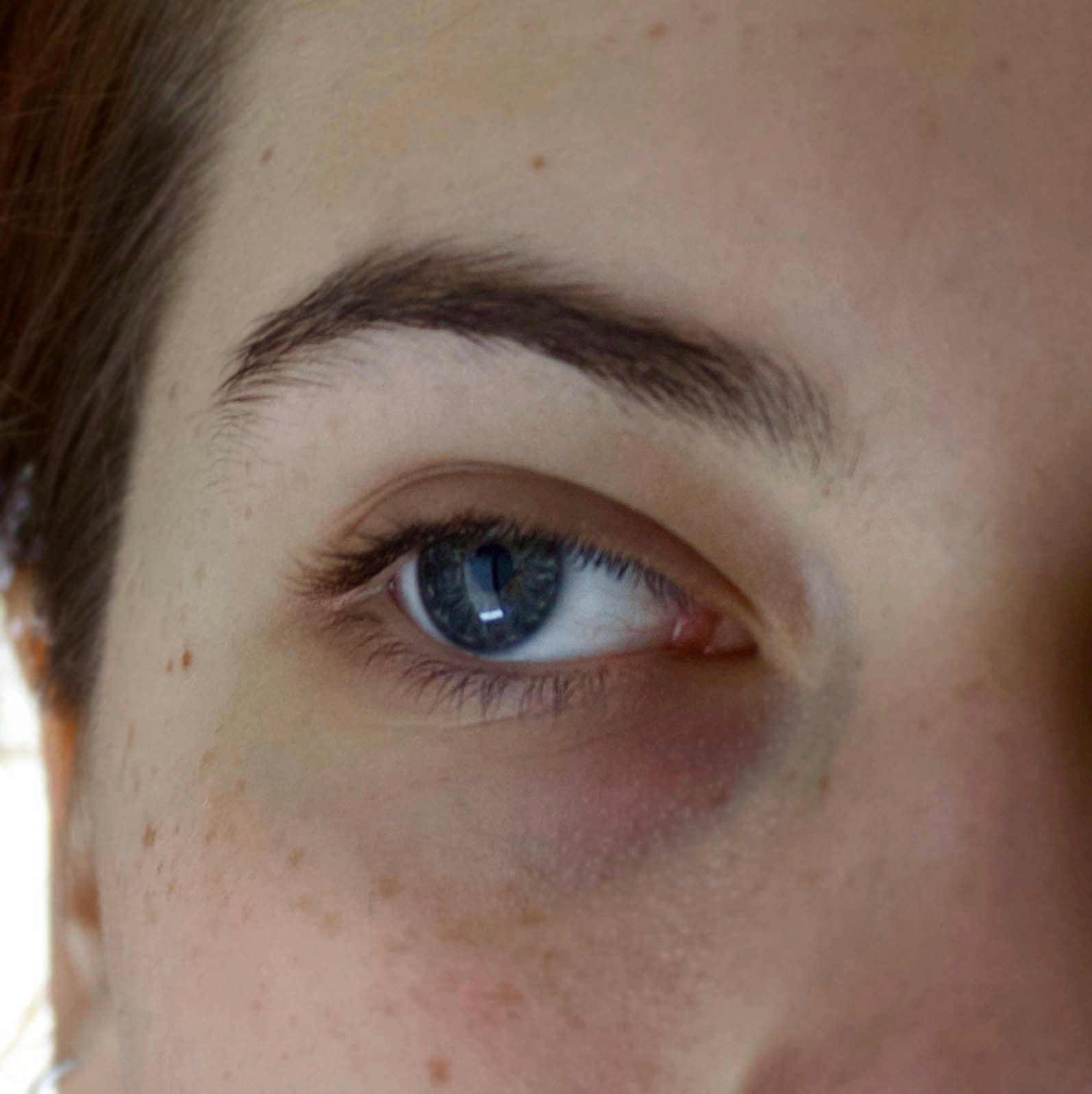 Photograph of an eye looking slightly to the left